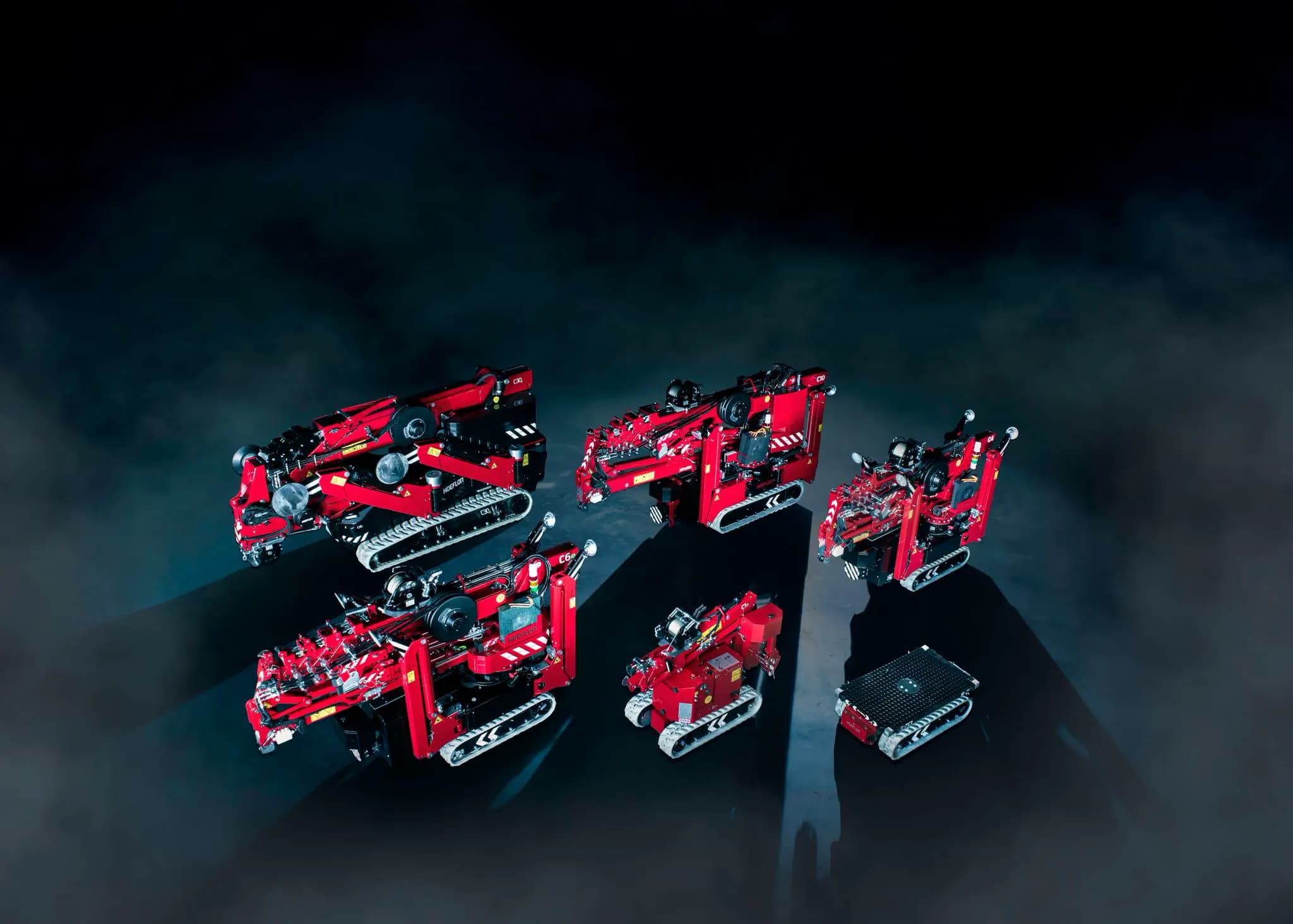 Afbeelding van Hoeflon compacte kranen en een carrier.